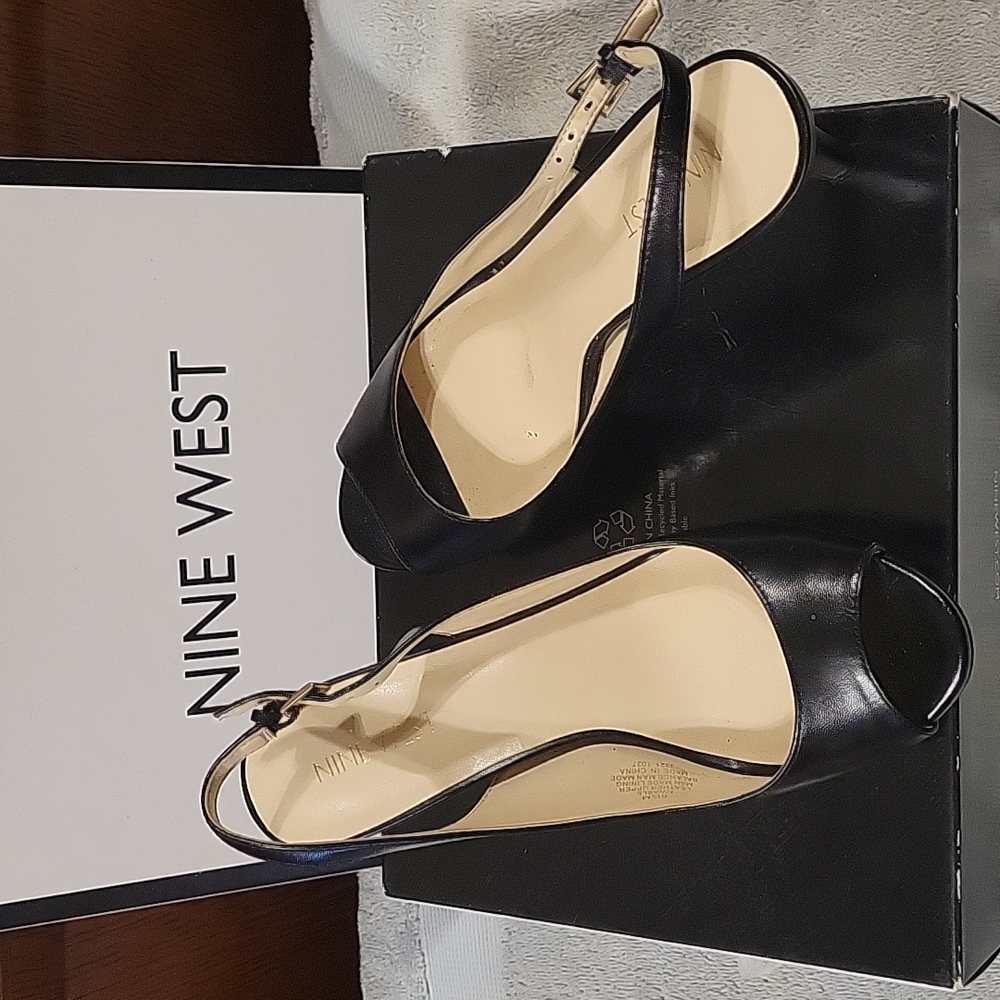 Black 3" heals. Peep toe